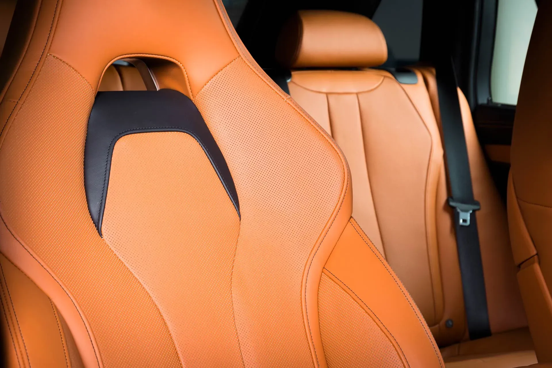 Orange leather car seats restored by Direct Finish Yorkshire