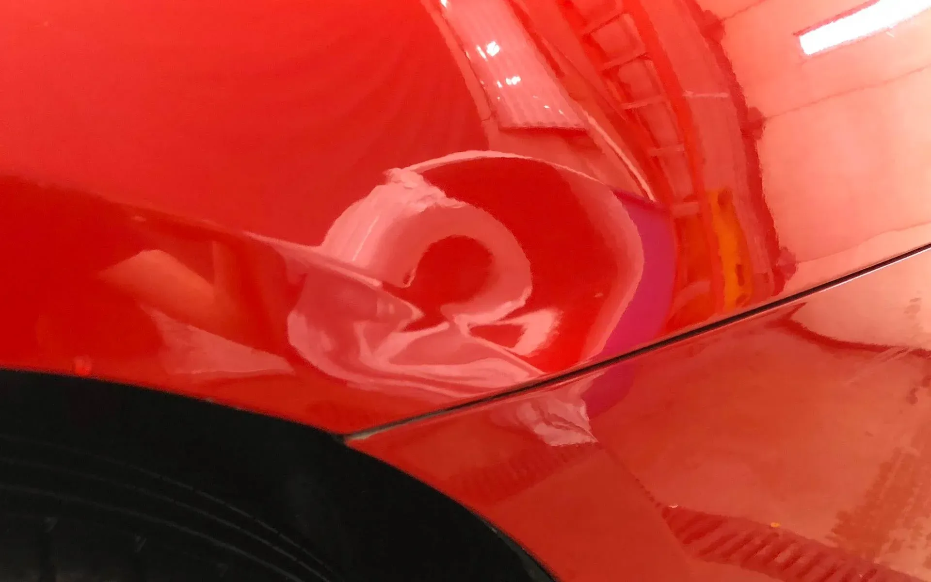 Paintless dent removal on a car panel by Direct Finish Yorkshire